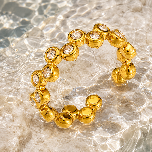 Kerri Ring in 18K gold-plated stainless steel, splashed with water