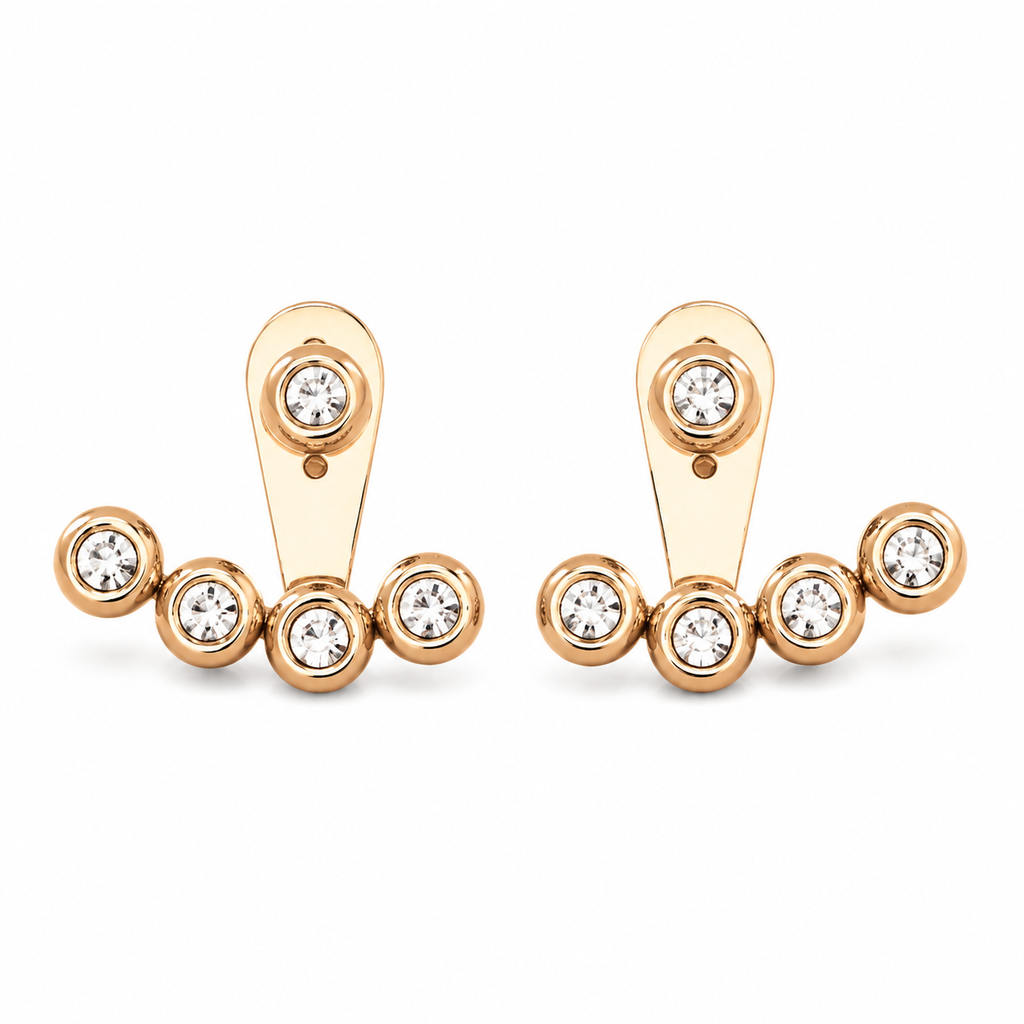 A pair of rose gold stud earrings with a curved post and five clear round-cut gemstones in bezel settings, displayed on a clean white background.