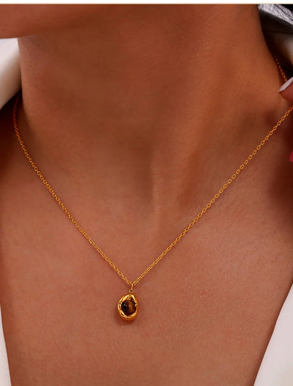 Mia Necklace in 18K gold-plated stainless steel, worn on model
