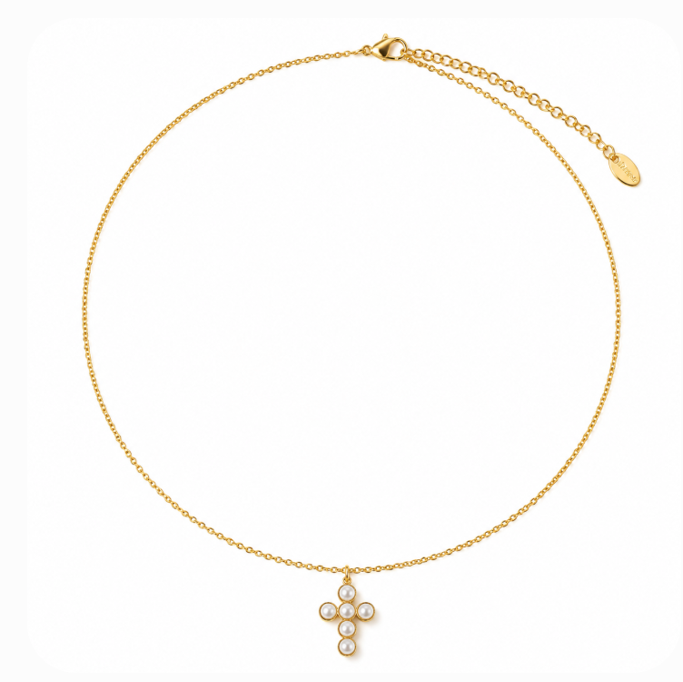 A delicate gold chain necklace with a small cross pendant adorned with white pearls, displayed on a clean white background.
