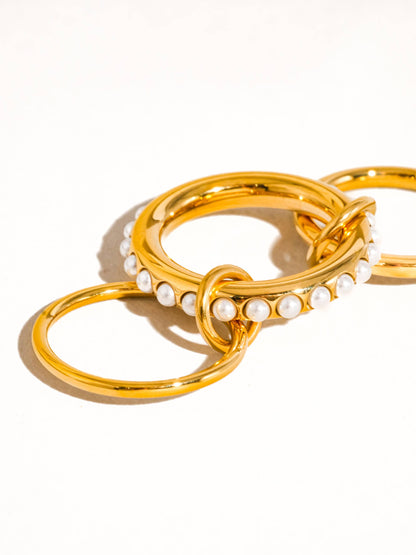 Sirena Ring in 18K gold-plated stainless steel with pearl accents, on a white background