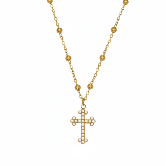 Cross pendant necklace on blank white background