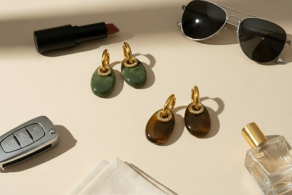 Maia Earrings flat lay with aviator sunglasses