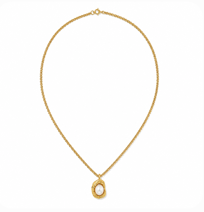 A delicate gold chain necklace with a textured gold pendant setting holding a single white pearl, displayed on a clean white background.
