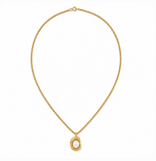 A delicate gold chain necklace with a textured gold pendant setting holding a single white pearl, displayed on a clean white background.